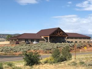 a large building on the side of a road at Canyon Country Lodge in Escalante