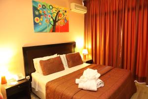 Letto o letti in una camera di Mozart Hotel