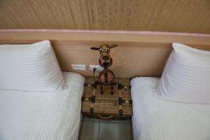Postel nebo postele na pokoji v ubytování Catt Leya B&B Hotel