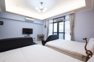 Postel nebo postele na pokoji v ubytování Catt Leya B&B Hotel