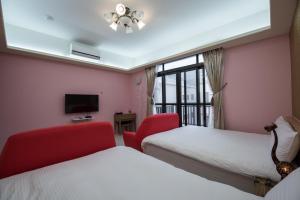 Postel nebo postele na pokoji v ubytování Catt Leya B&B Hotel