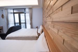 Postel nebo postele na pokoji v ubytování Catt Leya B&B Hotel