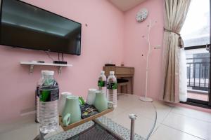 TV a/nebo společenská místnost v ubytování Catt Leya B&B Hotel