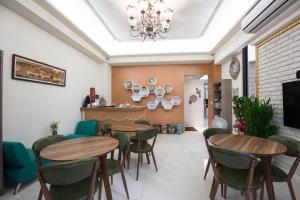 TV a/nebo společenská místnost v ubytování Catt Leya B&B Hotel