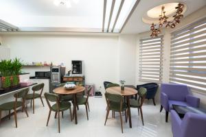 Posezení v ubytování Catt Leya B&B Hotel