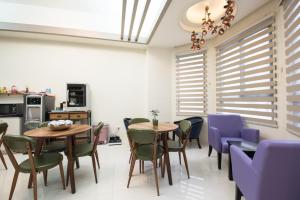 Posezení v ubytování Catt Leya B&B Hotel