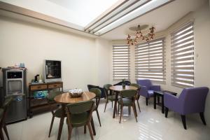 TV a/nebo společenská místnost v ubytování Catt Leya B&B Hotel