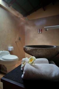 Ett badrum på Sari Gili Bungalow