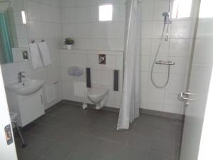 Koupelna v ubytování Hotel St. Binderup