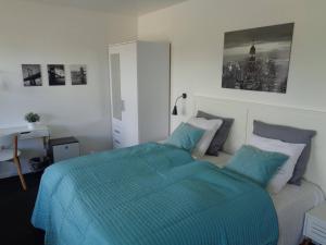 Postel nebo postele na pokoji v ubytování Hotel St. Binderup