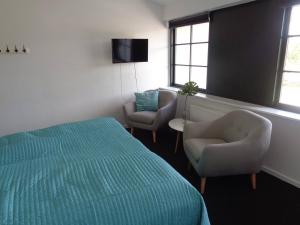 Postel nebo postele na pokoji v ubytování Hotel St. Binderup