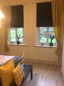 Postel nebo postele na pokoji v ubytování Villa Pusteblume
