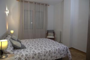 Postel nebo postele na pokoji v ubytování Piso con Encanto