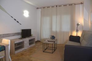 TV a/nebo společenská místnost v ubytování Piso con Encanto