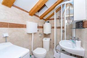 Kúpeľňa v ubytovaní Apartment Maria Di + 11 fotografií