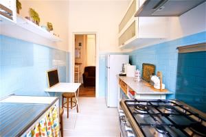 Nhà bếp/bếp nhỏ tại Vetrina Holidays Apartment Navona