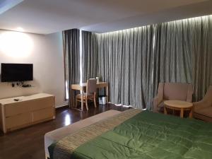 TV a/nebo společenská místnost v ubytování Vgp Golden Beach Resort