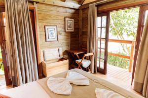 Postel nebo postele na pokoji v ubytování Pousada Homestay Jaraguá Do Sul + 37 fotografií
