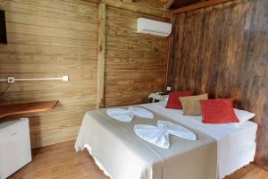 Postel nebo postele na pokoji v ubytování Pousada Homestay Jaraguá Do Sul