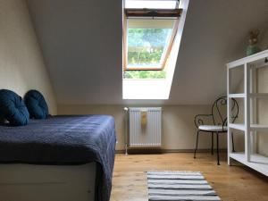 Llit o llits en una habitació de Ferienhaus im Fischersteig