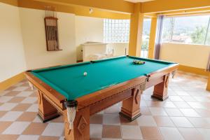 Biliár nebo kulečník v ubytování Pousada Homestay Jaraguá Do Sul