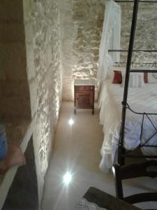 Postel nebo postele na pokoji v ubytování Borgo in corte
