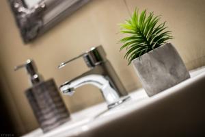 A bathroom at ClickTheFlat Tamka Street Apart Rooms