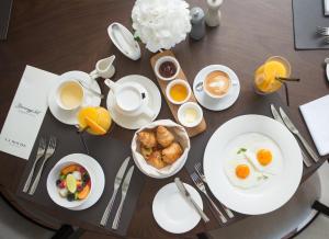 Možnosti snídaně pro hosty v ubytování Boutique Hotel La Roche