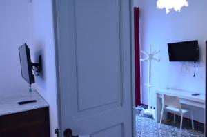 TV a/nebo společenská místnost v ubytování B&B la cascata