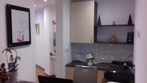 Kuchyň nebo kuchyňský kout v ubytování Residence Brunello