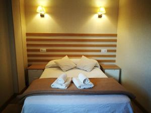 Postel nebo postele na pokoji v ubytování Casa Lili