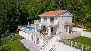 an aerial view of a house with a swimming pool at Villa Carmen in Opatija