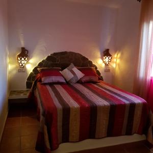 Hacienda el Mirador tesisinde bir odada yatak veya yataklar