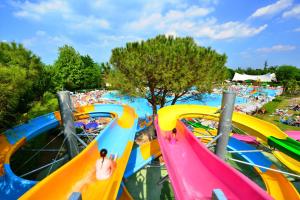 a group of water slides at a water park at Camping Bella Italia in Peschiera del Garda