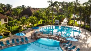 an overhead view of a pool at a resort at Allegro Cozumel All-Inclusive in Cozumel +53 photos