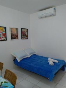 Un pat sau paturi într-o cameră la FLATS MONTE CASTELO GRAVATÁ - Com Wi-Fi