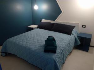 Postel nebo postele na pokoji v ubytování Ananke B&B