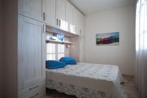 Postel nebo postele na pokoji v ubytování Hotel Residence Stella del Mare