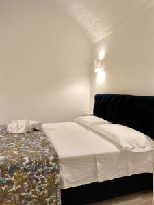 Giường trong phòng chung tại Loft Nonna Francesca