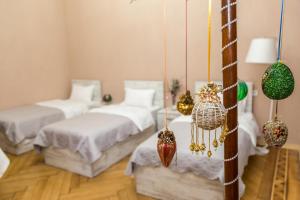 Postel nebo postele na pokoji v ubytování Atlant Hotel + 37 fotografií