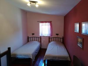 Katil atau katil-katil dalam bilik di House Kamenjak