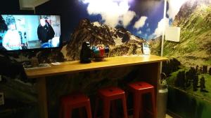 TV a/nebo společenská místnost v ubytování Hostal Avenida + 22 fotografií