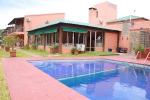 Piscina en o cerca de Apart Hotel Natural del Daymán