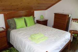 Ένα ή περισσότερα κρεβάτια σε δωμάτιο στο Grande Tranquilidade