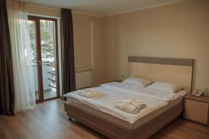 Postel nebo postele na pokoji v ubytování Apartment 607 in ORBI PALACE