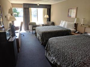 Postel nebo postele na pokoji v ubytování Days Inn by Wyndham Seguin TX