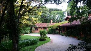 Um jardim em Casa Goldoni Gramado