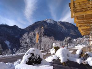 a view of a mountain with snow on the ground at Dolomiti Lodge Villa Gaia in Venas