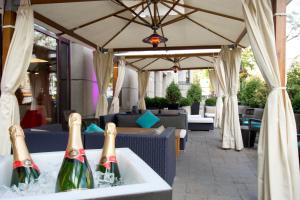 a group of champagne bottles sitting in a table at Novotel Montreal Center in Montreal