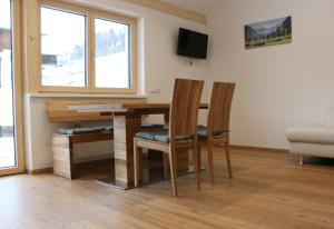 TV a/nebo společenská místnost v ubytování Ferienwohnung Därflihof